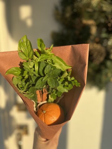 An herb bundle wrapped in brown packaging paper